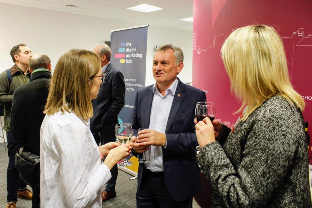 guests chat at a previous Digital Marketing Hub event